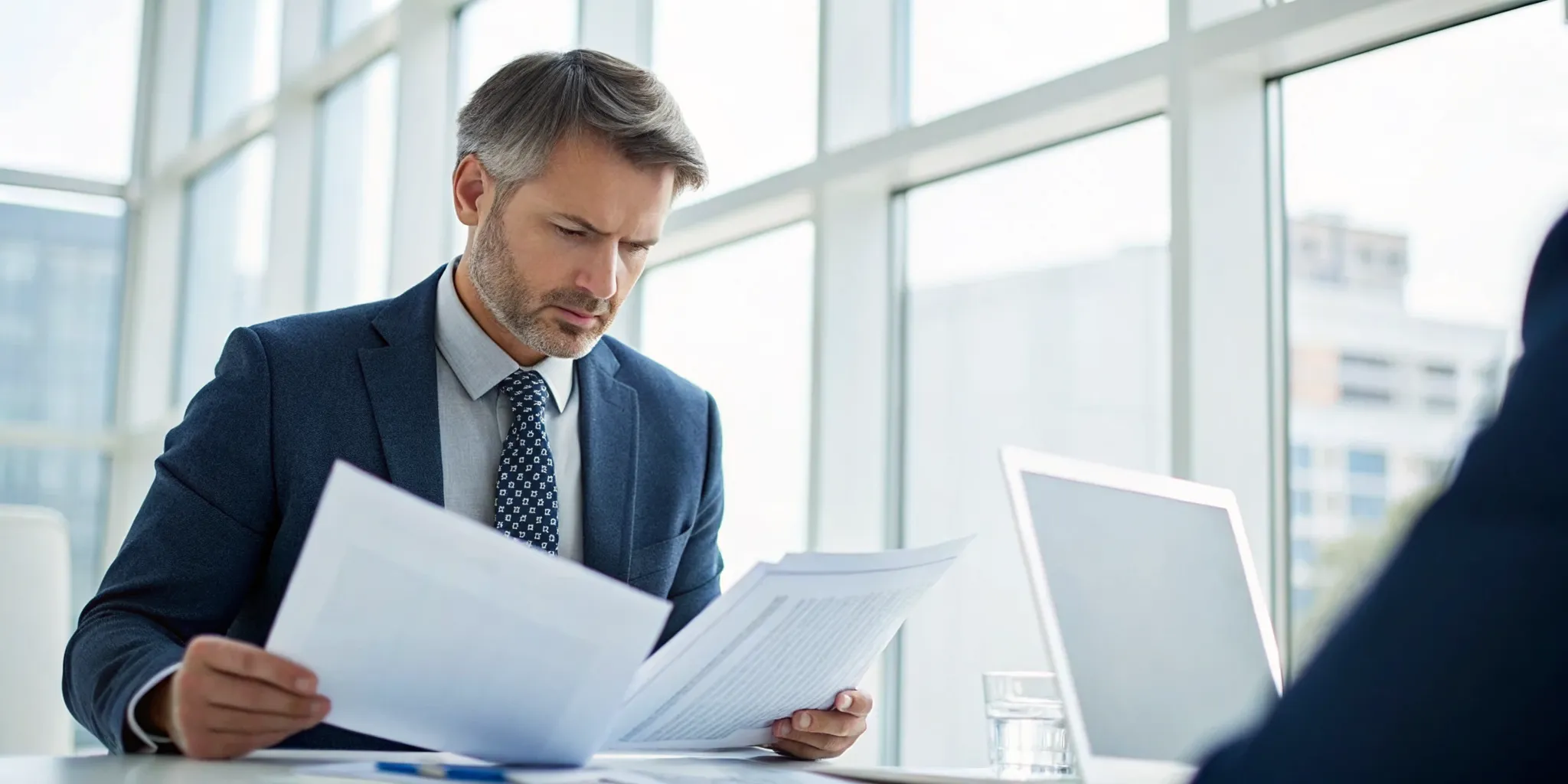 A professional preparing for an IPO by reviewing PCAOB audit requirements.